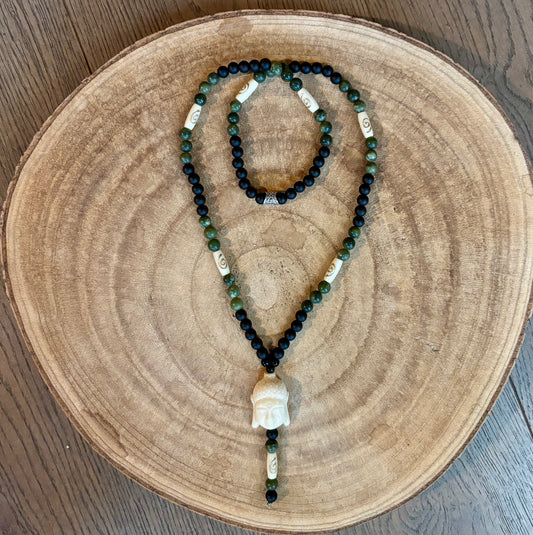 Herenketting met Cremé Boeddha hoofd.